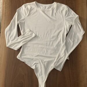 Naked Wardrobe White Long Sleeve Thong Bodysuit